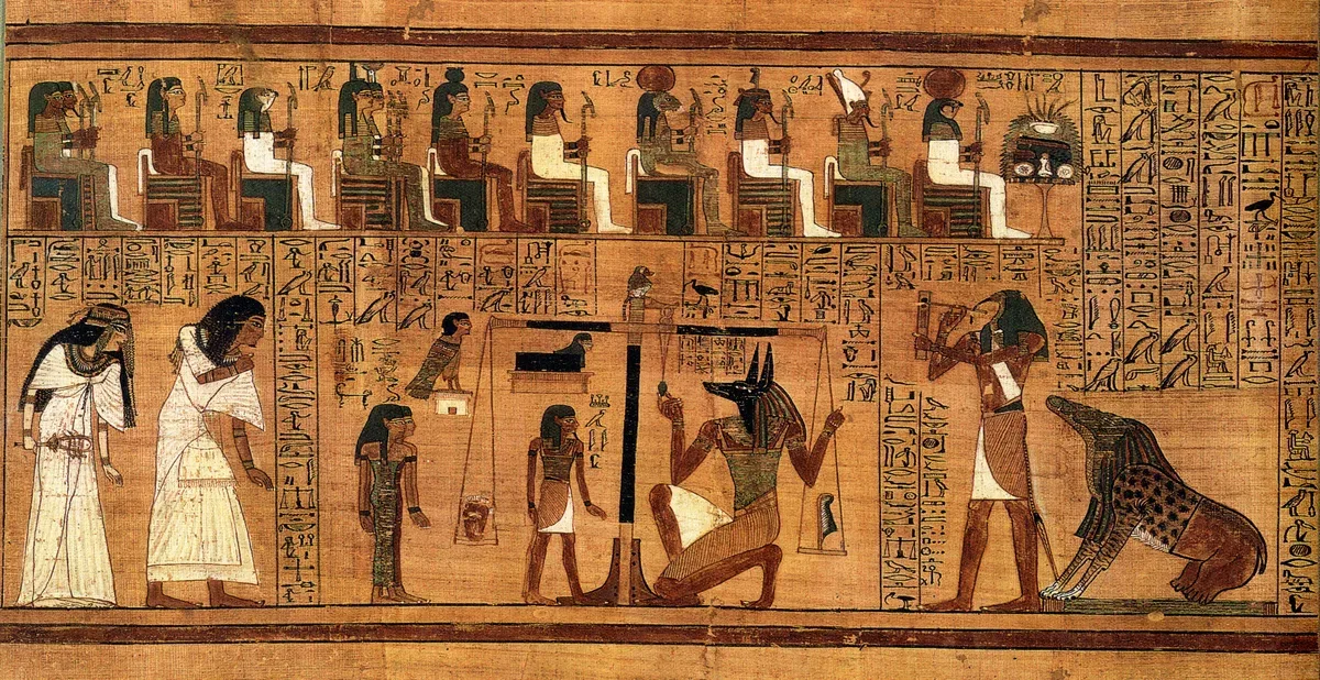 The weighing of the heart from the Egyptian Book of the Dead: Anubis balances Ani's heart against the feather of the goddess Ma'at, while Thoth records the outcome and the monster Ammit waits for the verdict.