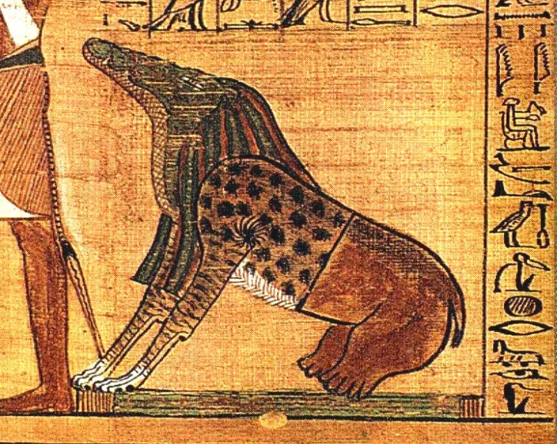 Ammit, a creature with a crocodile's head, the forequarters of a lion, and the hindquarters of a hippopotamus, devouring the unworthy in the weighing of the heart scene.